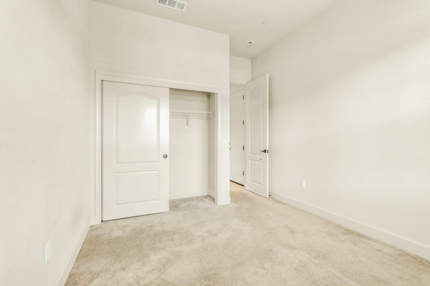4129 Castellina Way Manteca, CA 95337 - Photo 20 of 58 an empty room with closet area