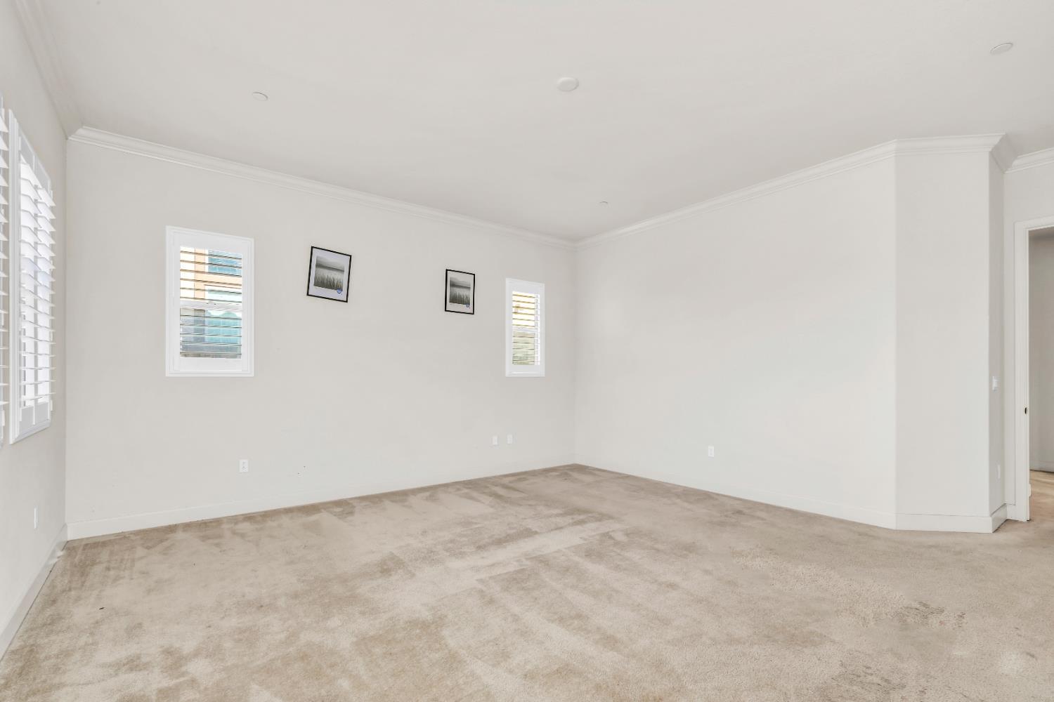 4129 Castellina Way Manteca, CA 95337 - Photo 36 of 58 a view of an empty room with a window