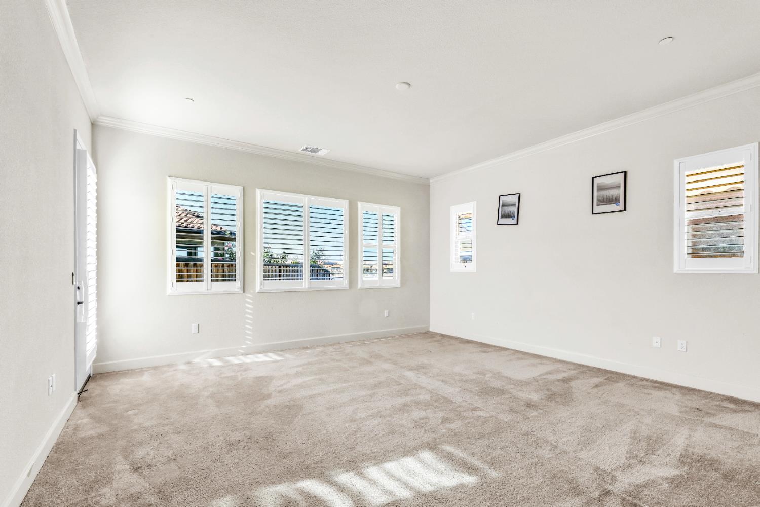 4129 Castellina Way Manteca, CA 95337 - Photo 38 of 58 a view of an empty room with a window