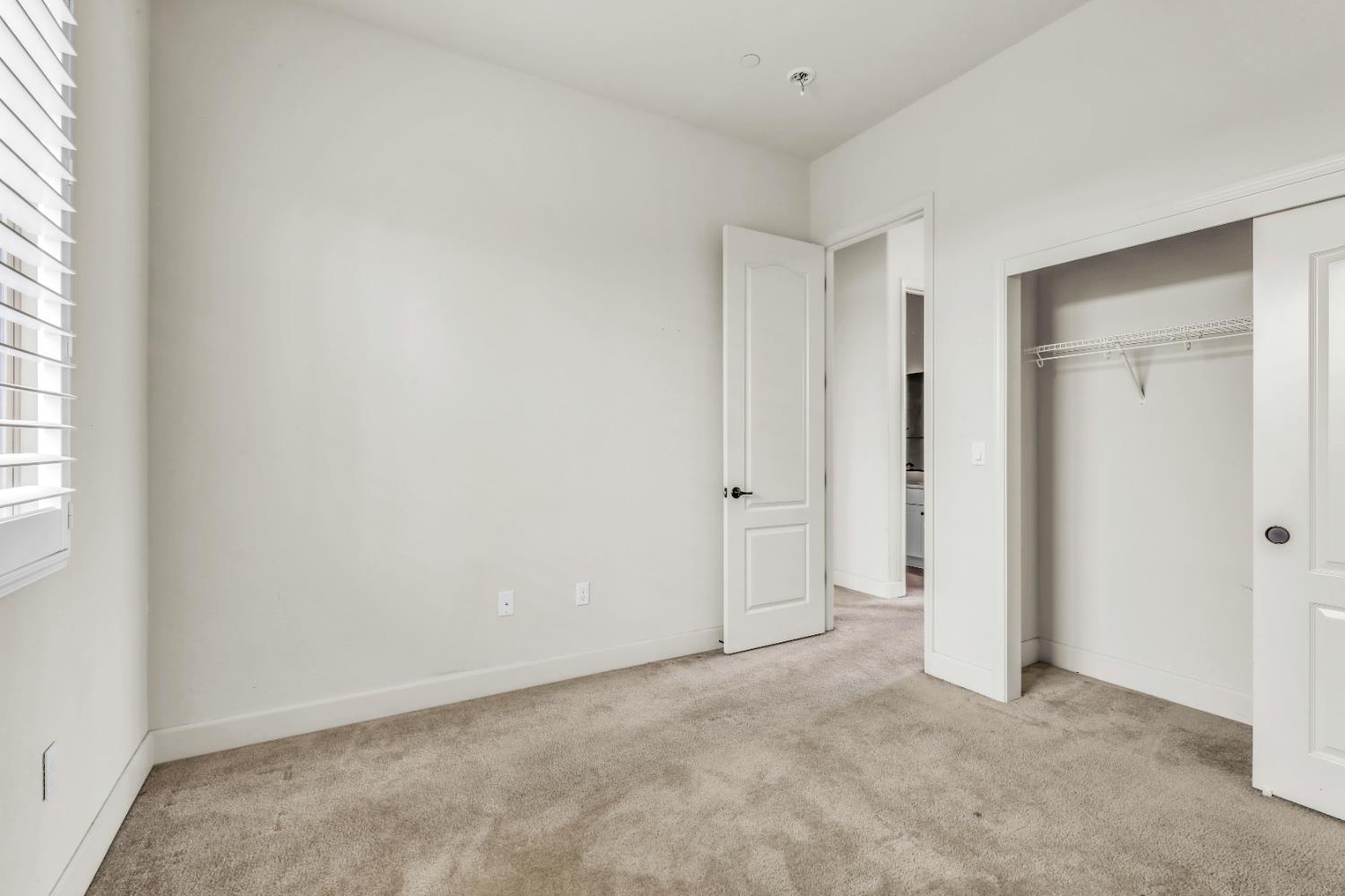 4129 Castellina Way Manteca, CA 95337 - Photo 40 of 58 an empty room with windows