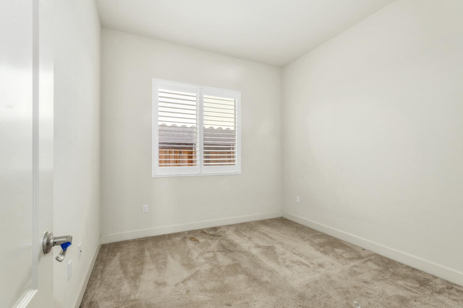 4129 Castellina Way Manteca, CA 95337 - Photo 41 of 58 an empty room with a window