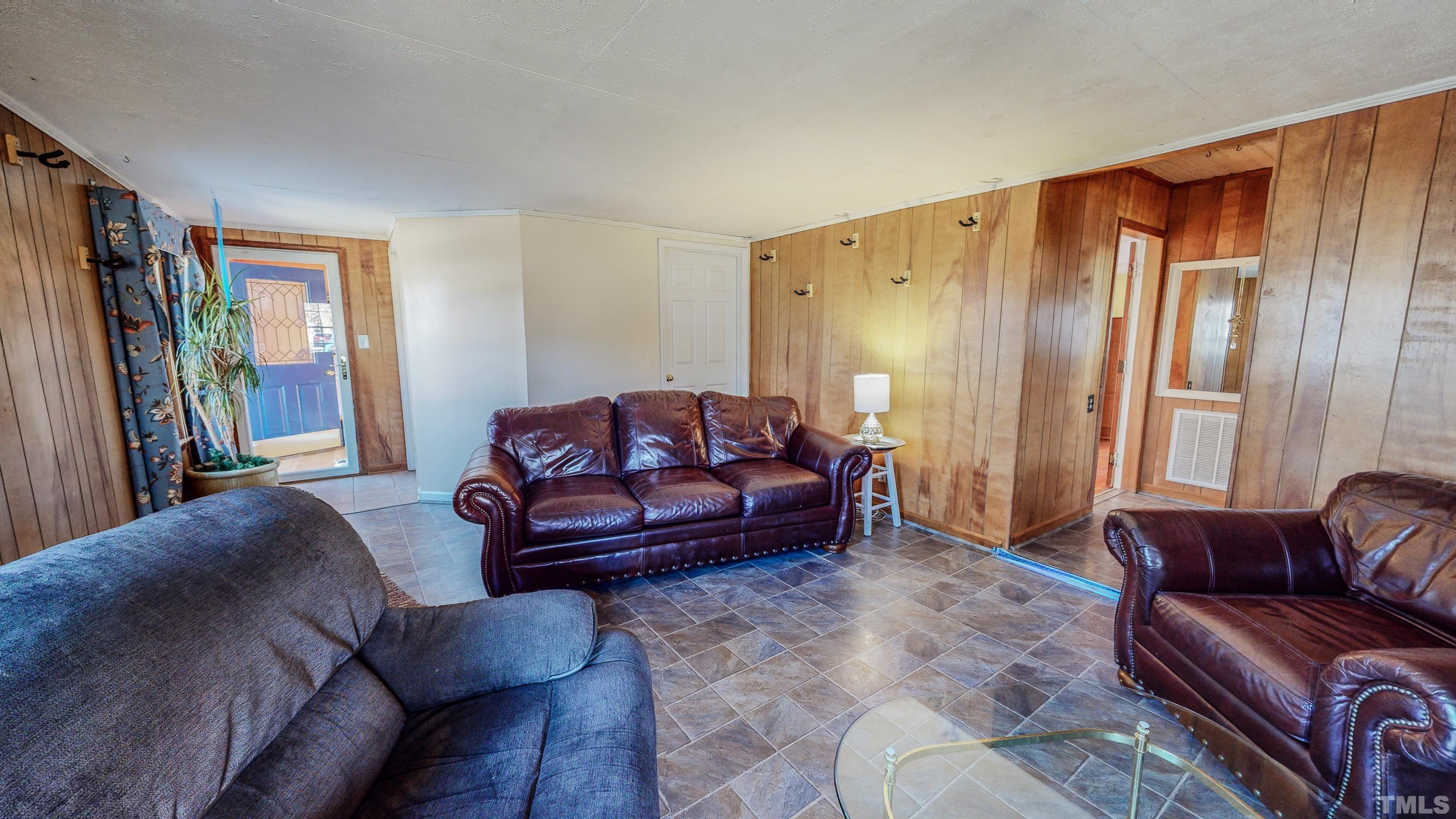 155 Hesters Store Road Roxboro, NC 27574 - Photo 11 of 77 a living room with furniture and a couch