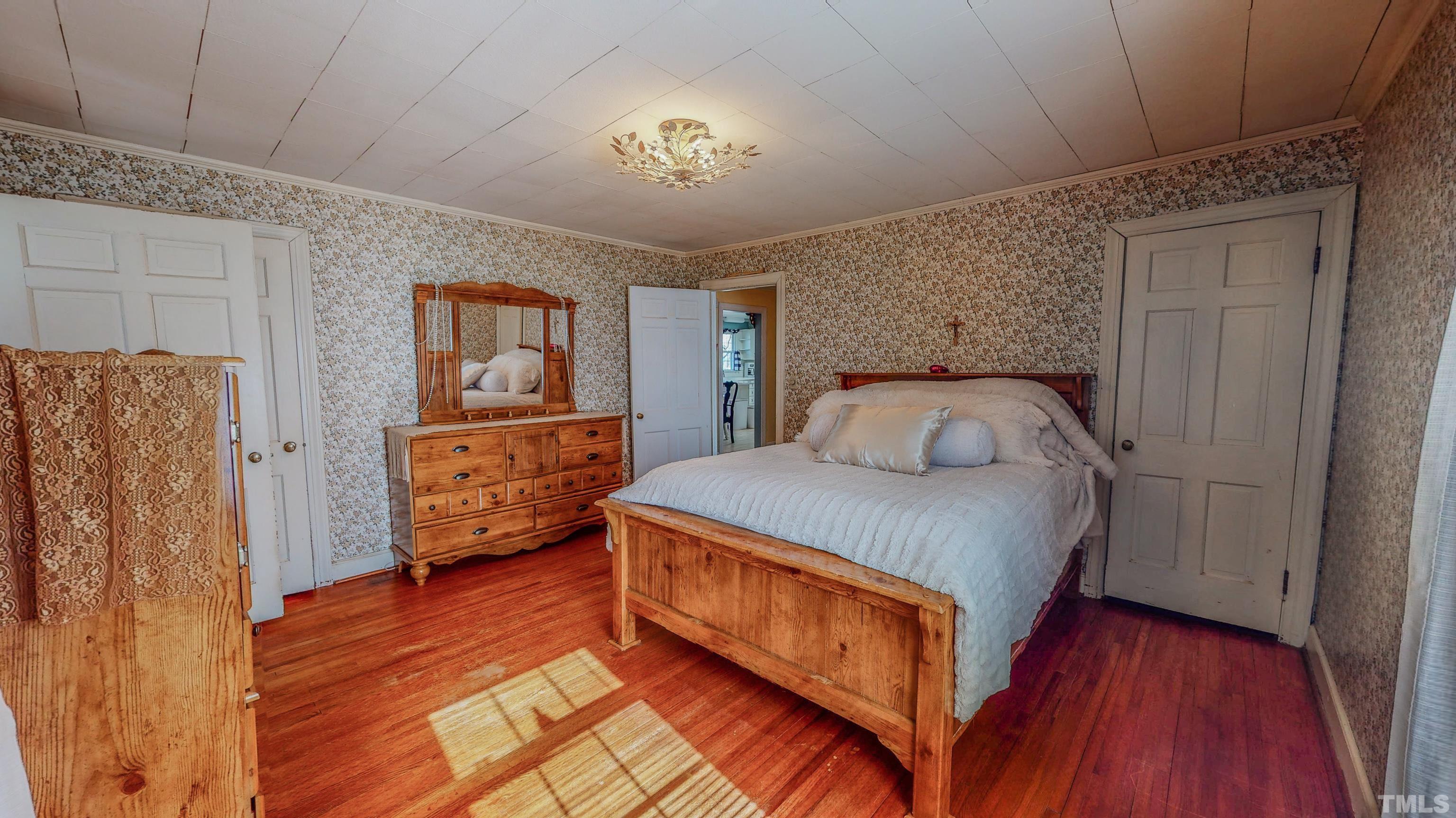 155 Hesters Store Road Roxboro, NC 27574 - Photo 13 of 77 a bedroom with a bed and a closet