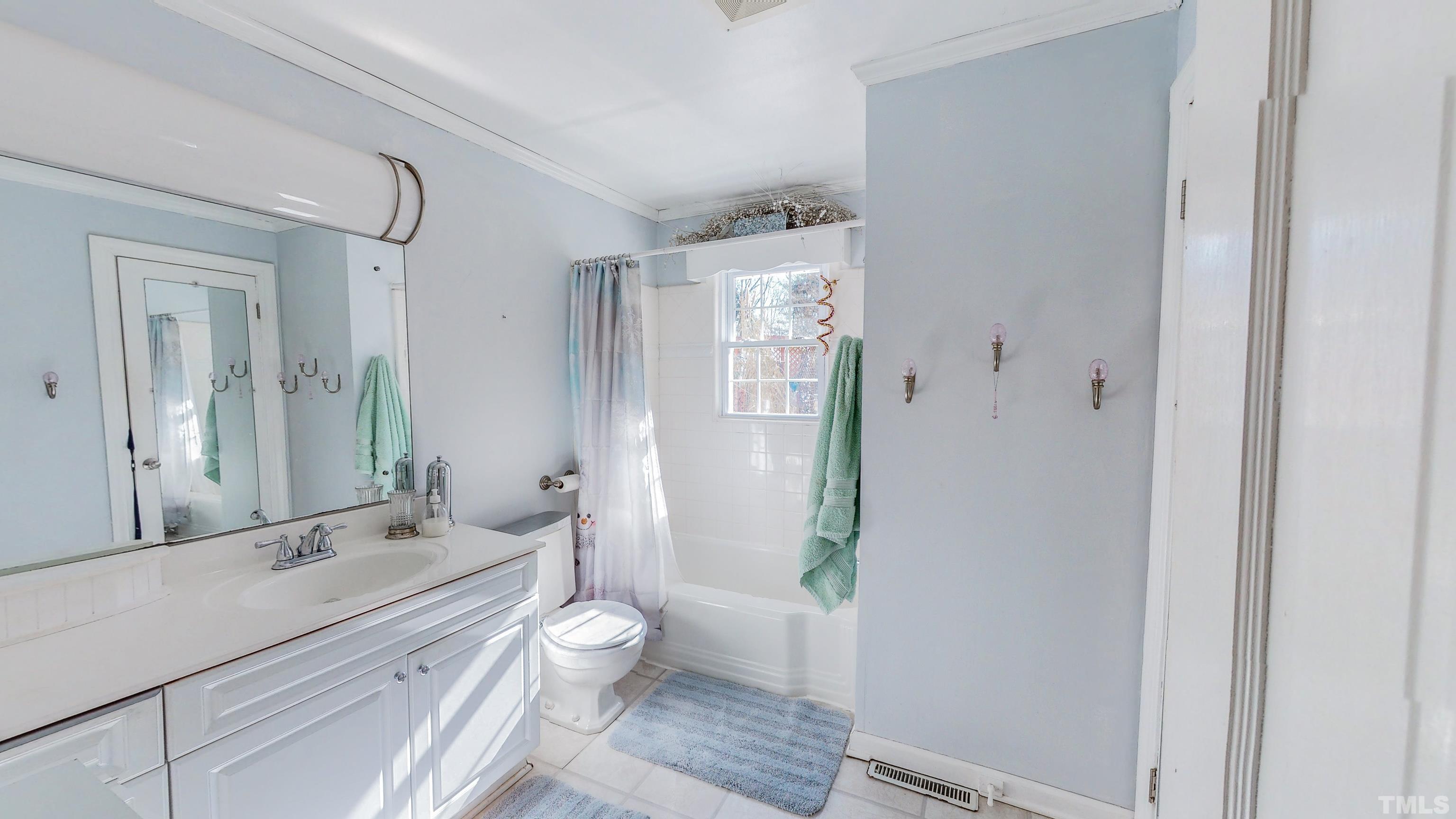 155 Hesters Store Road Roxboro, NC 27574 - Photo 17 of 77 a bathroom with a granite countertop sink toilet and shower