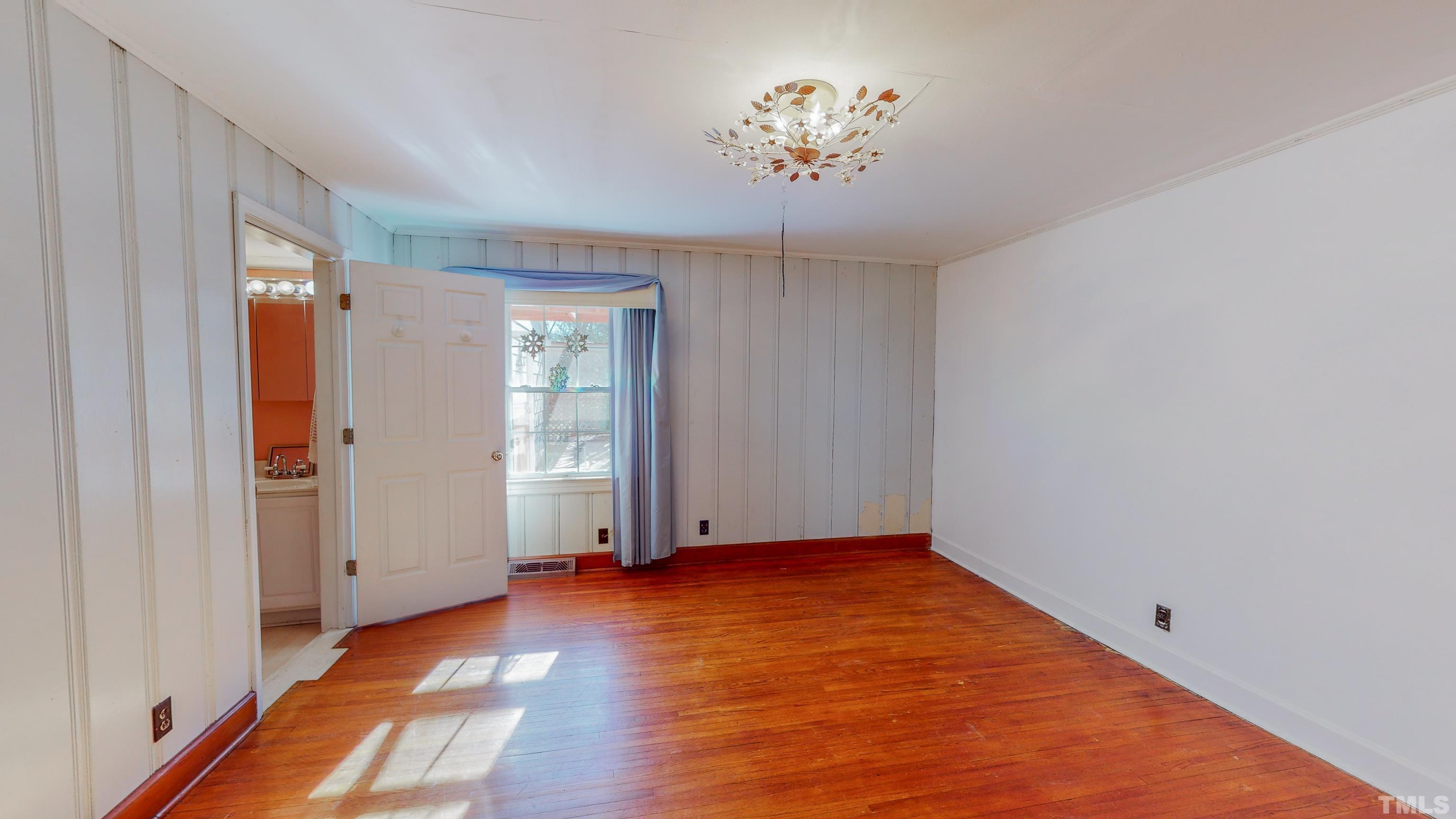 155 Hesters Store Road Roxboro, NC 27574 - Photo 24 of 77 wooden floor in an empty room with a window