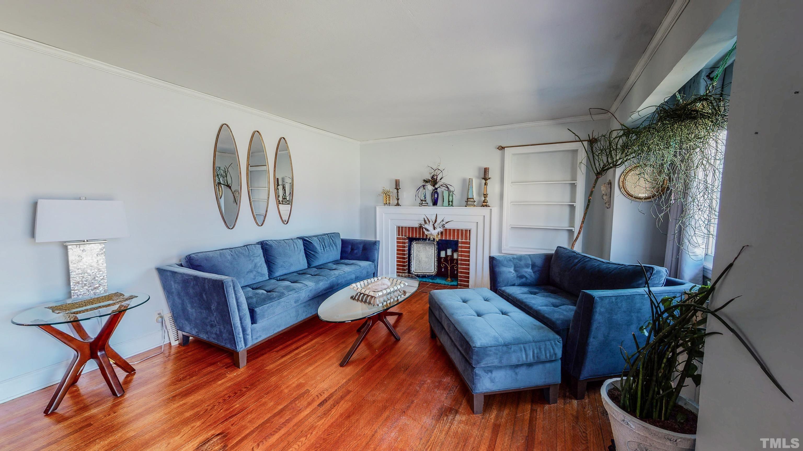 155 Hesters Store Road Roxboro, NC 27574 - Photo 27 of 77 a living room with furniture and wooden floor