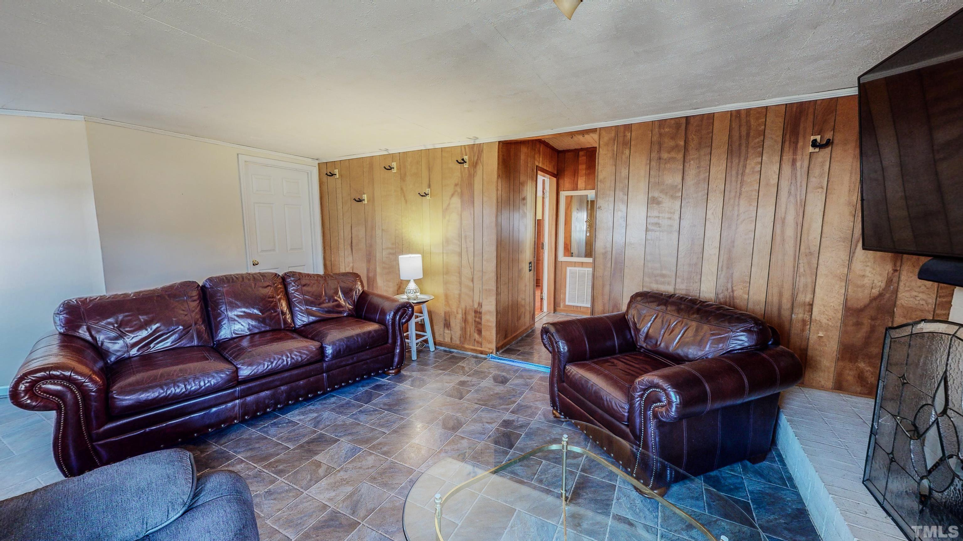 155 Hesters Store Road Roxboro, NC 27574 - Photo 31 of 77 a living room with furniture and a couch