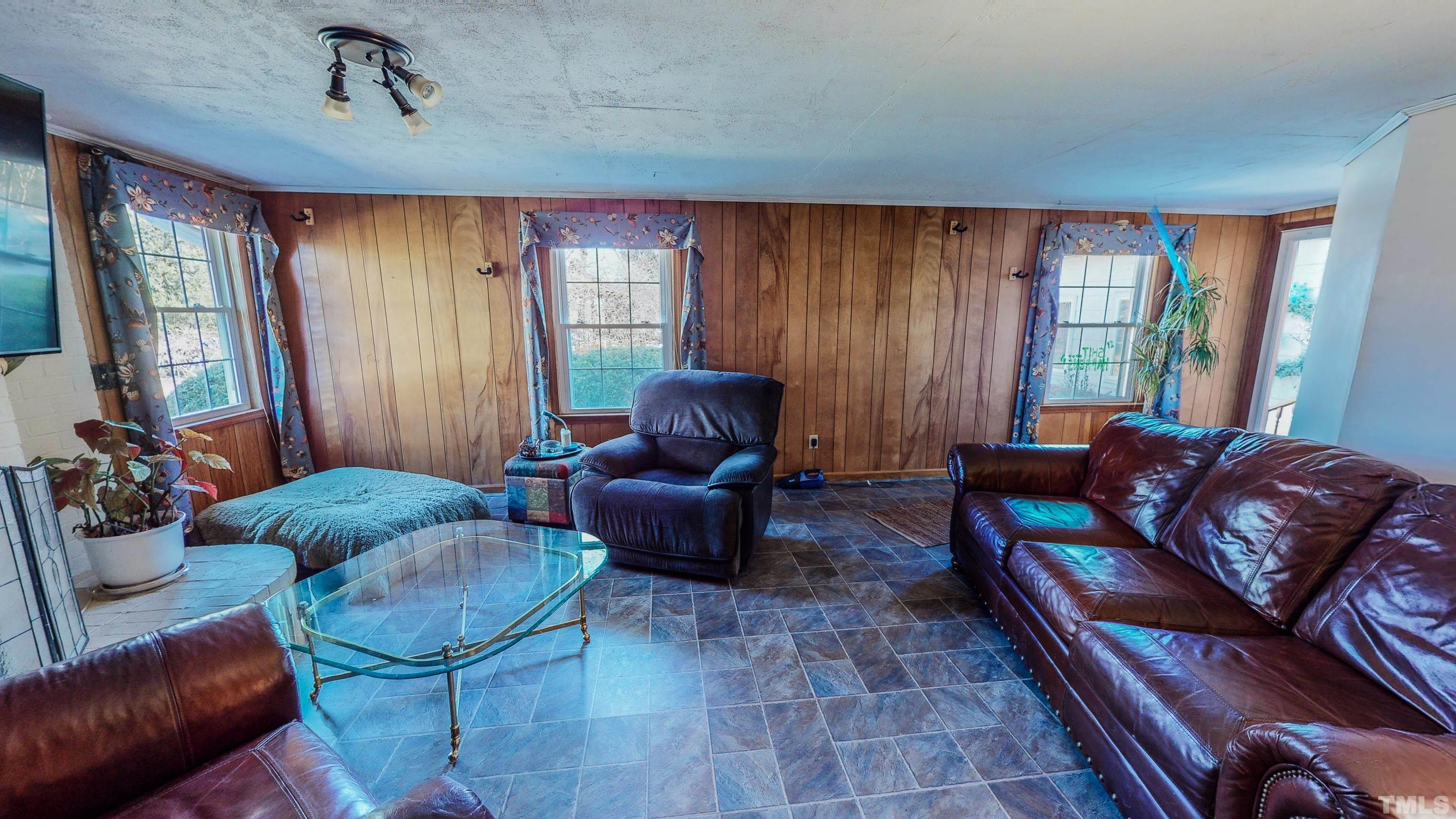 155 Hesters Store Road Roxboro, NC 27574 - Photo 32 of 77 a living room with furniture and a window