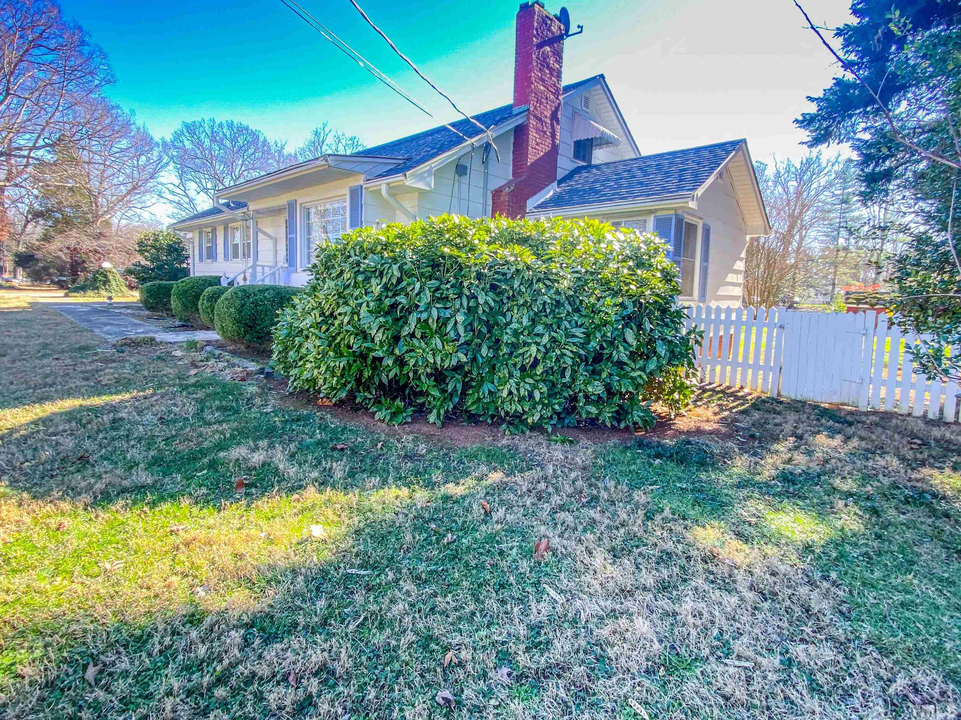 155 Hesters Store Road Roxboro, NC 27574 - Photo 35 of 77 a front view of a house with garden