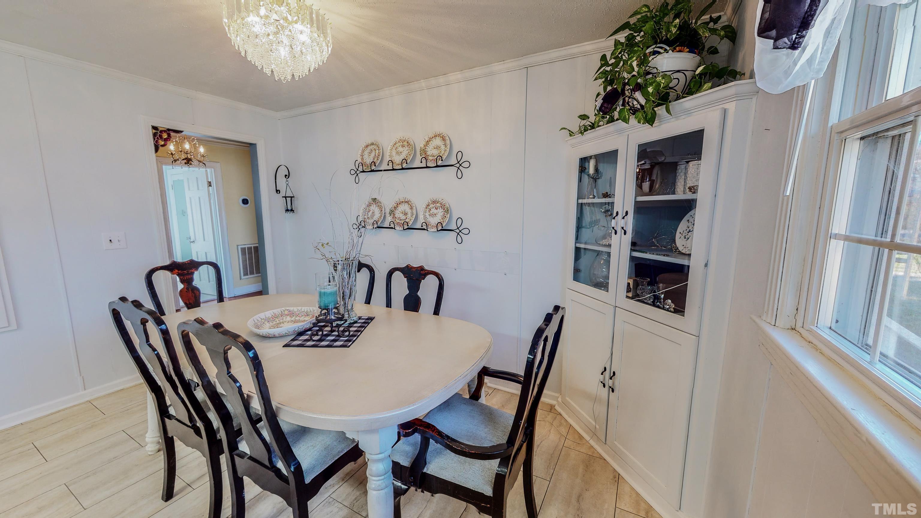 155 Hesters Store Road Roxboro, NC 27574 - Photo 43 of 77 a view of a dining room with furniture