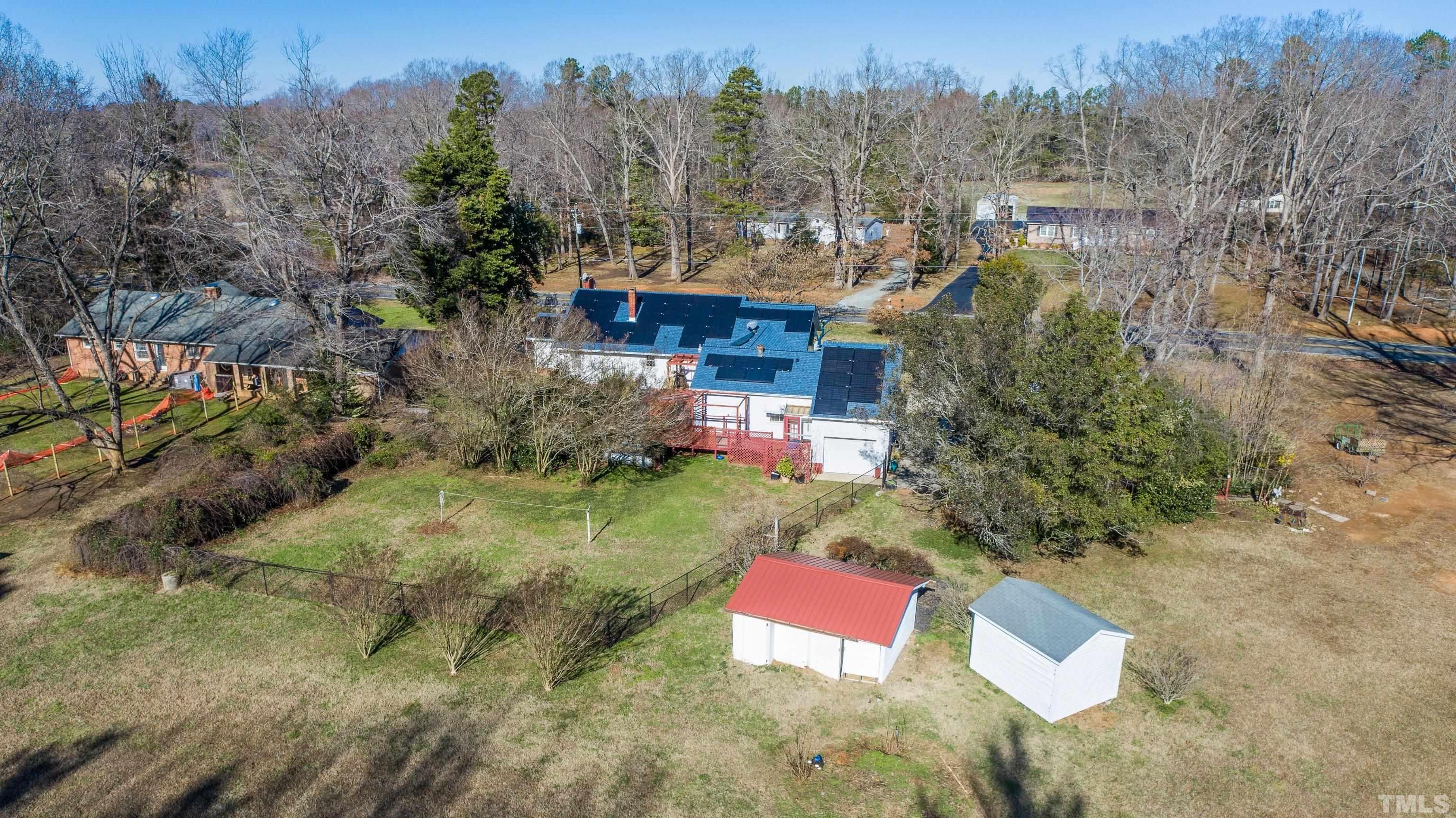 155 Hesters Store Road Roxboro, NC 27574 - Photo 48 of 77 a view of a house with a yard