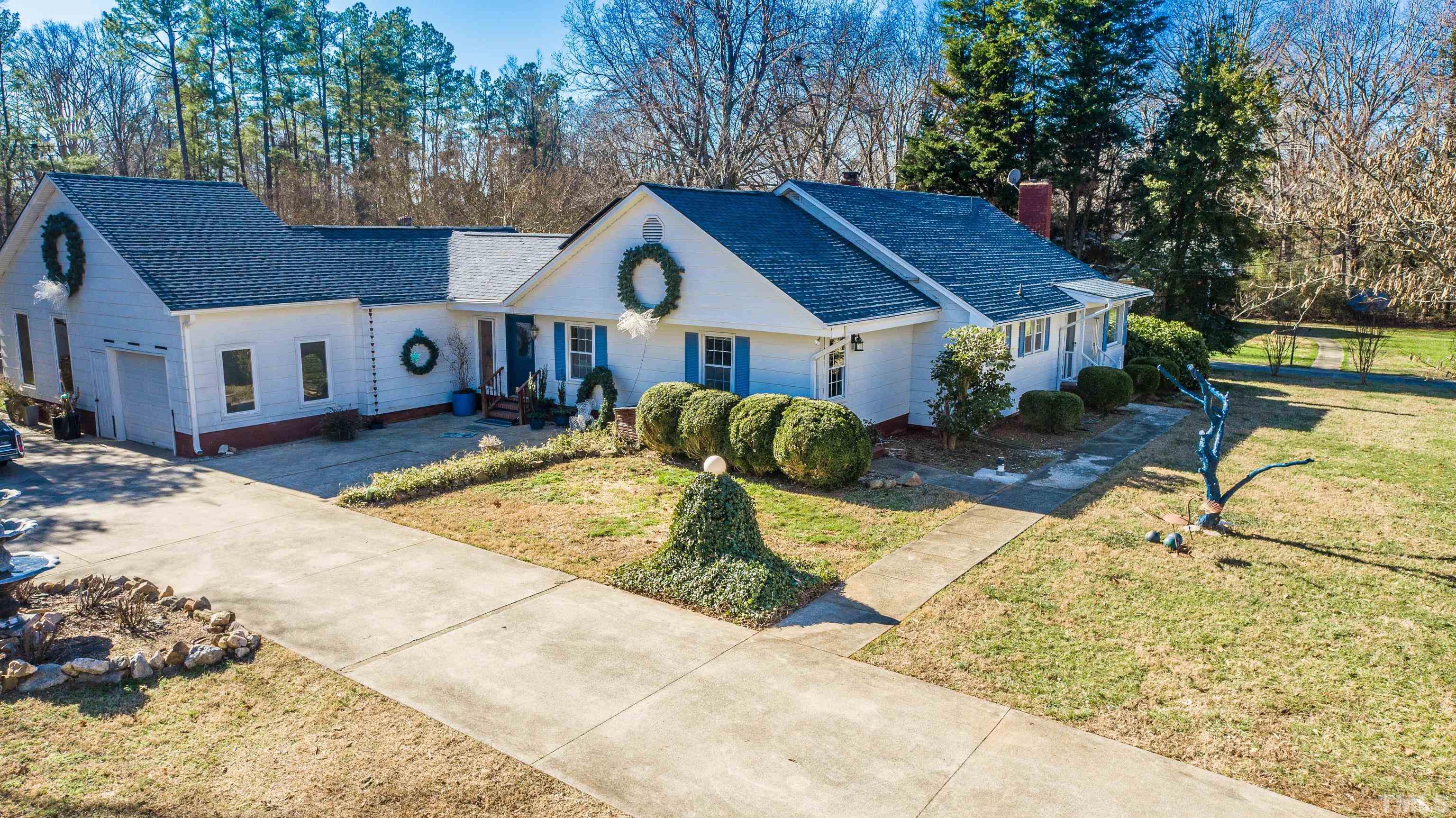 155 Hesters Store Road Roxboro, NC 27574 - Photo 50 of 77 a view of a house with wooden fence