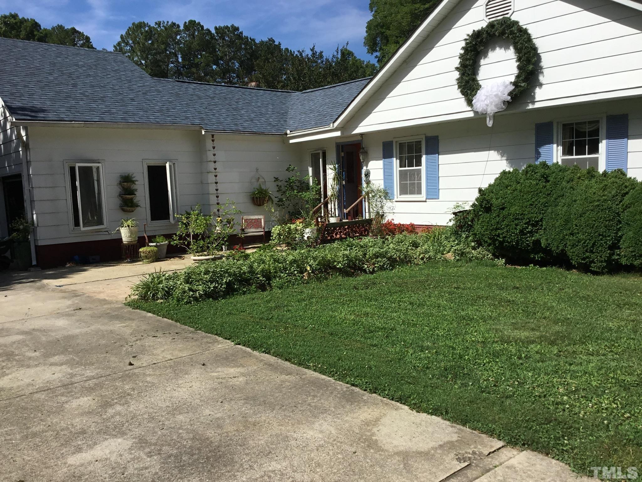 155 Hesters Store Road Roxboro, NC 27574 - Photo 75 of 77 a front view of a house with a yard