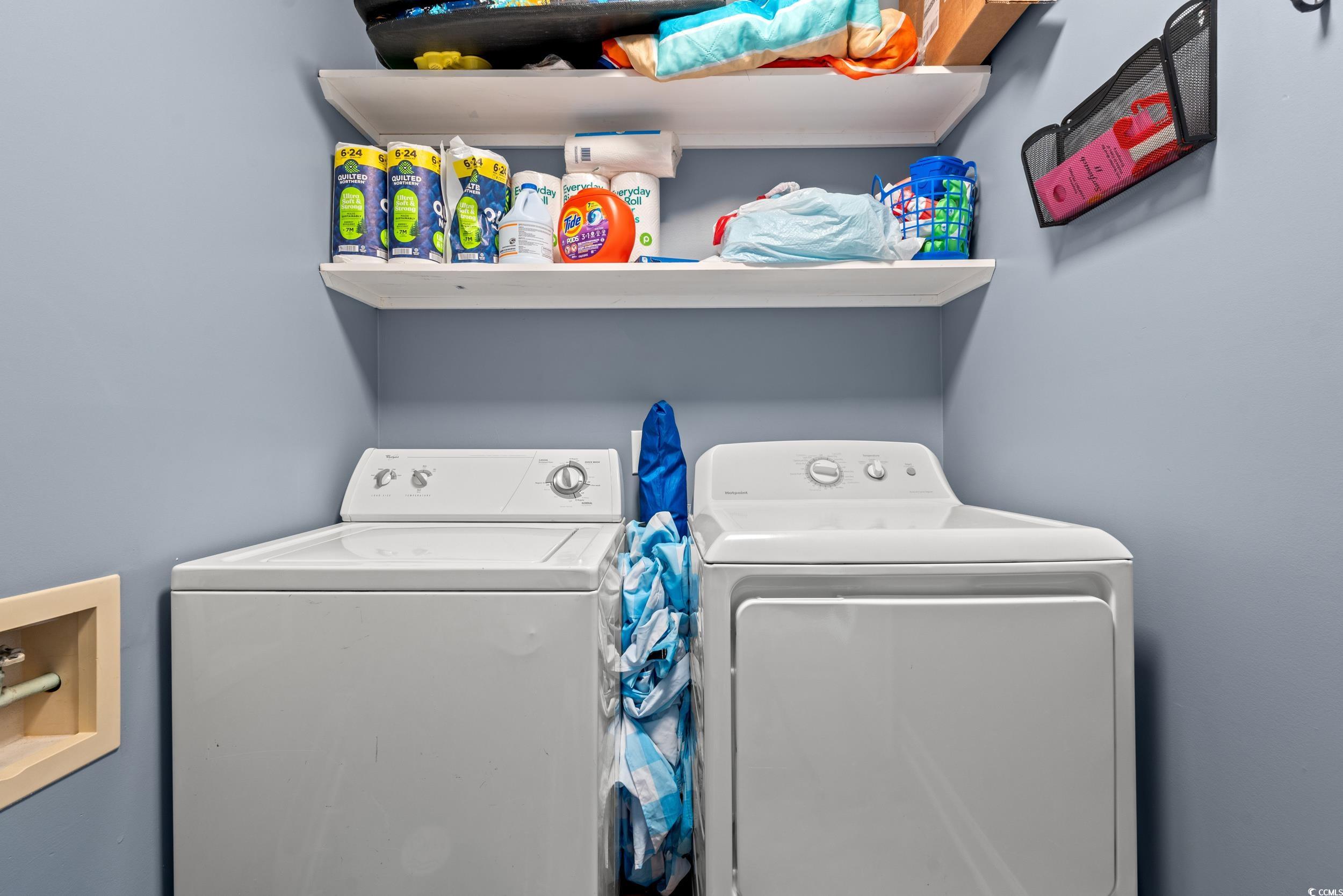 917 Ocean Boulevard South, Unit 304 Surfside Beach, SC 29575 - Photo 22 of 38 Laundry area featuring washer and clothes dryer