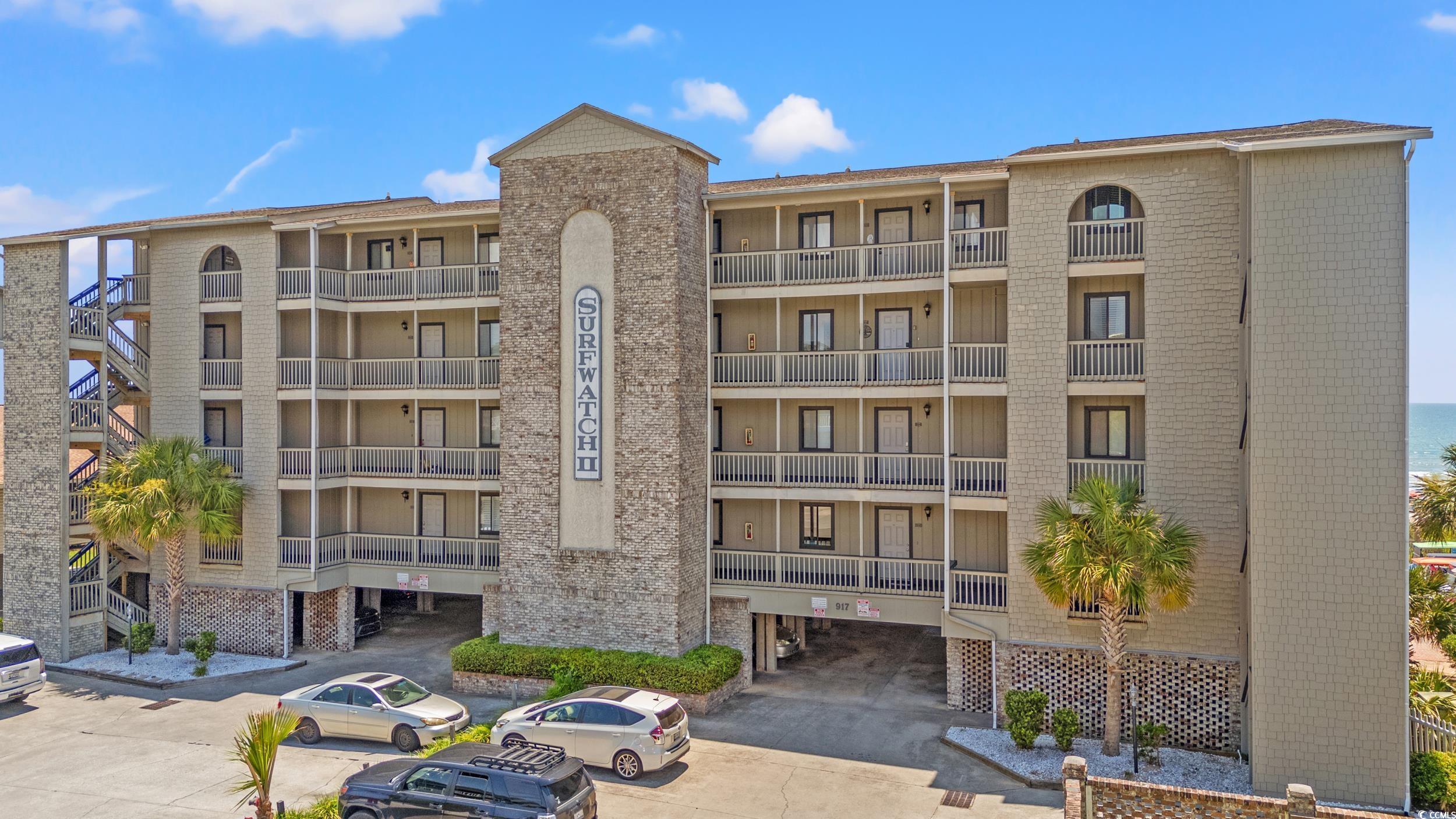 917 Ocean Boulevard South, Unit 304 Surfside Beach, SC 29575 - Photo 30 of 38 View of apartment building / complex