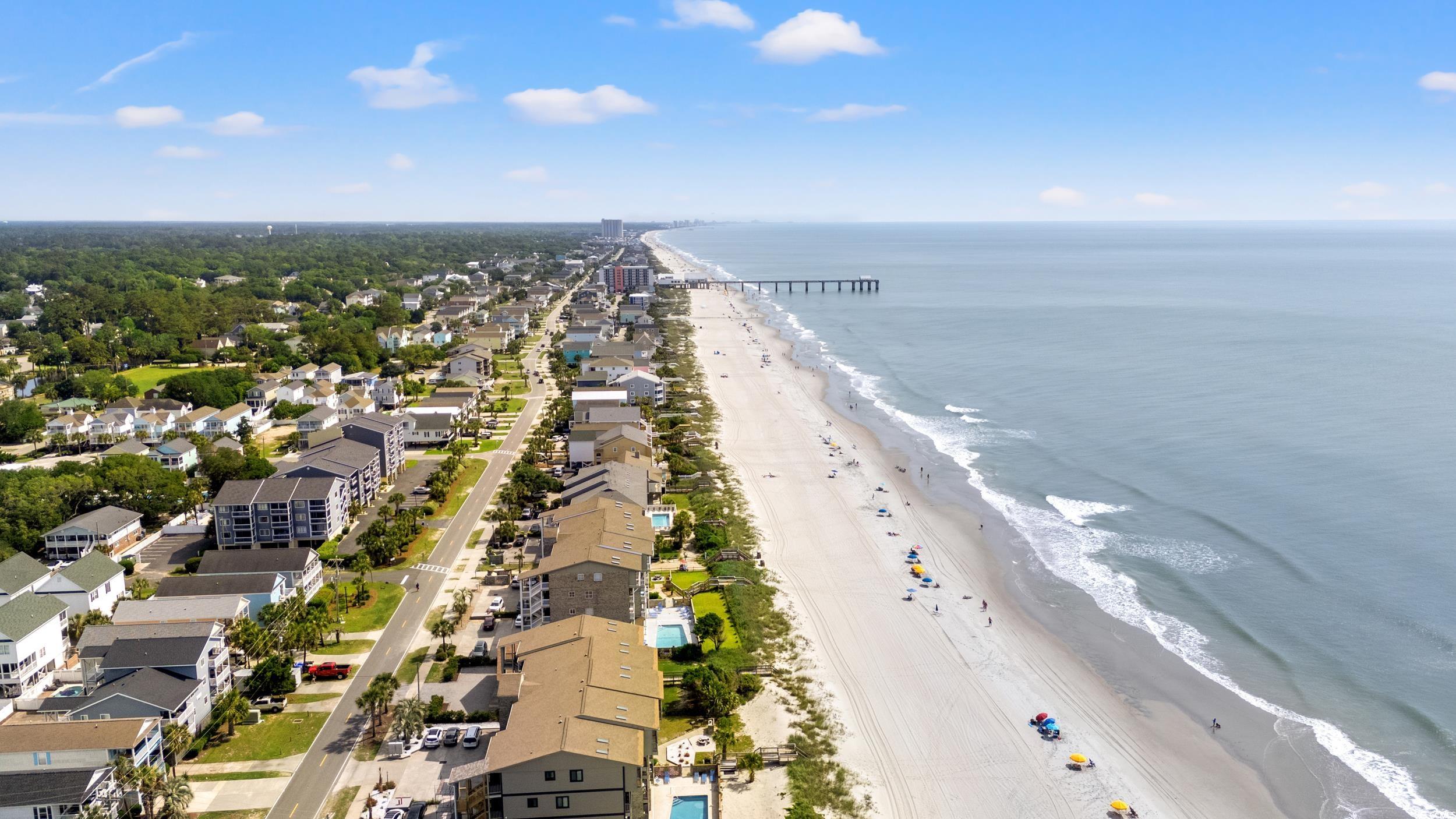 917 Ocean Boulevard South, Unit 304 Surfside Beach, SC 29575 - Photo 35 of 38 Aerial view of unending shoreline