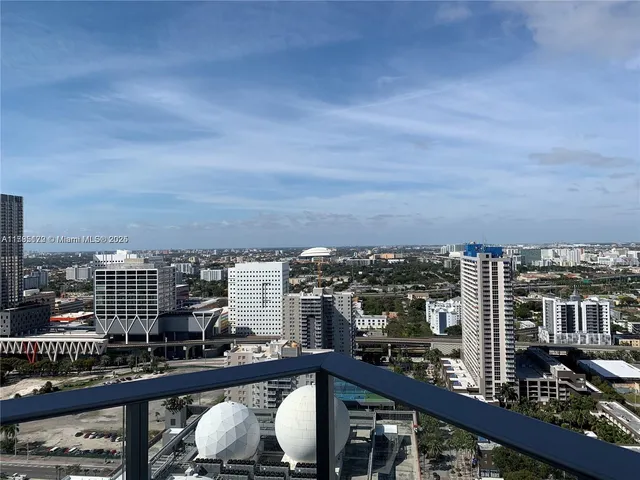 a view of a balcony with city