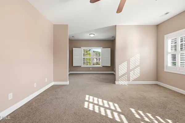 a view of an empty room and window