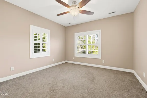 a view of a door and a window