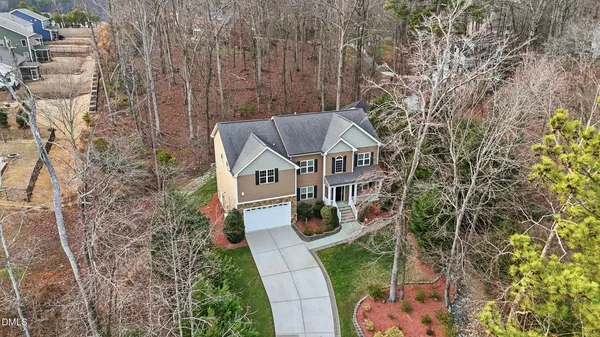 a aerial view of a house with a garden