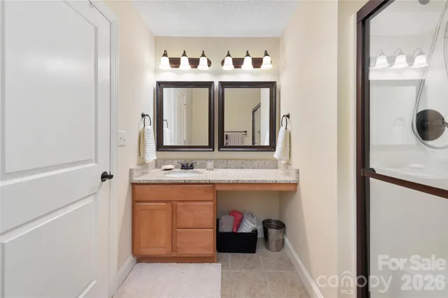 a view of a hallway with washer and dryer