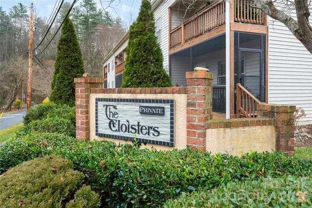 a street sign on a pole on a street