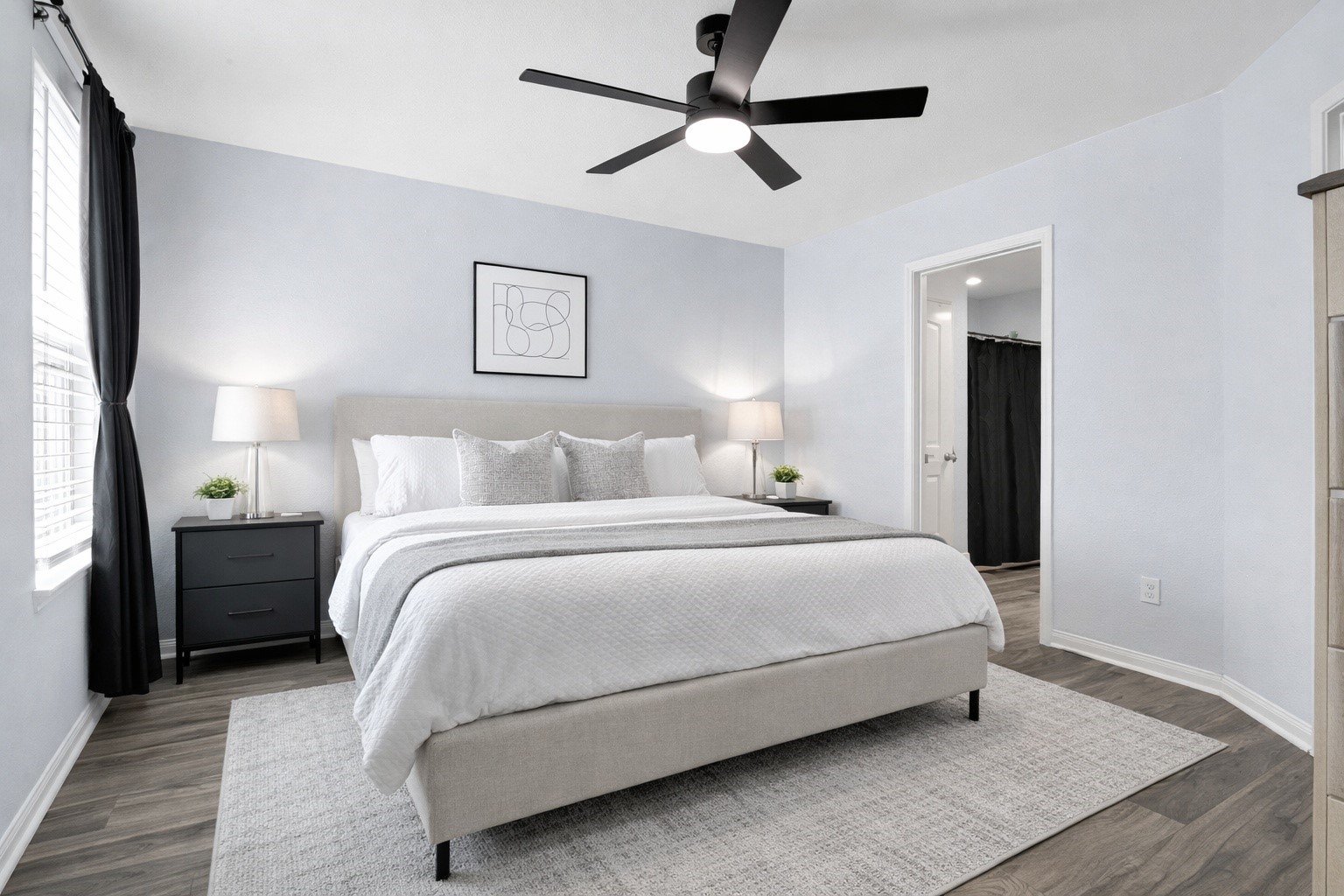 1802 Opal Peach Drive Rosharon, TX 77583 - Photo 15 of 35 a bedroom with a bed and ceiling fan