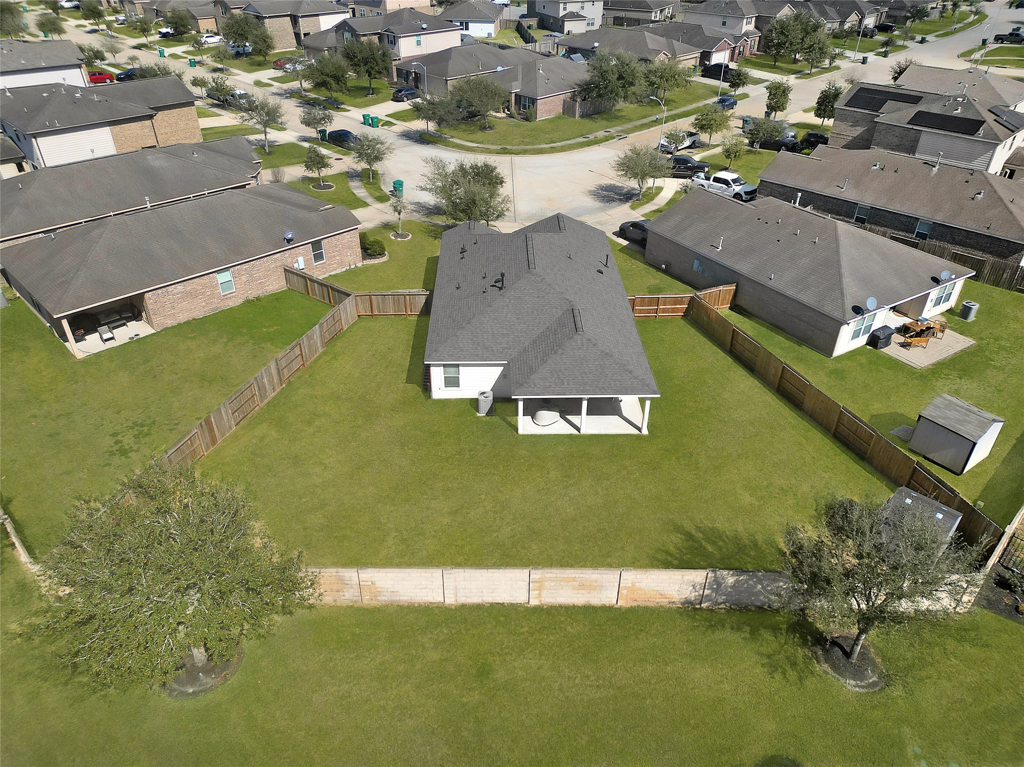 1802 Opal Peach Drive Rosharon, TX 77583 - Photo 2 of 35 an aerial view of a house with a yard