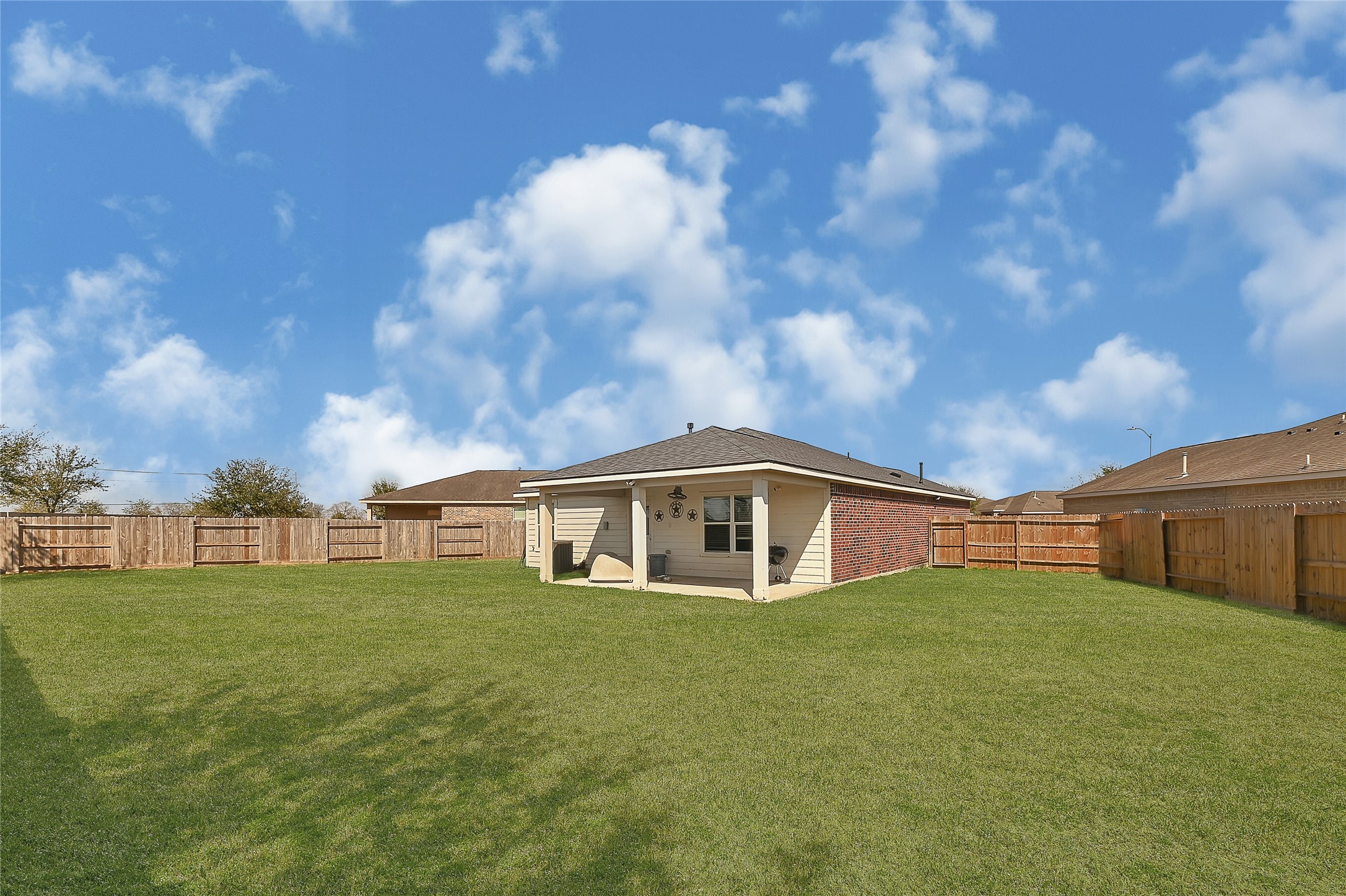 1802 Opal Peach Drive Rosharon, TX 77583 - Photo 23 of 35 a view of house with a big yard