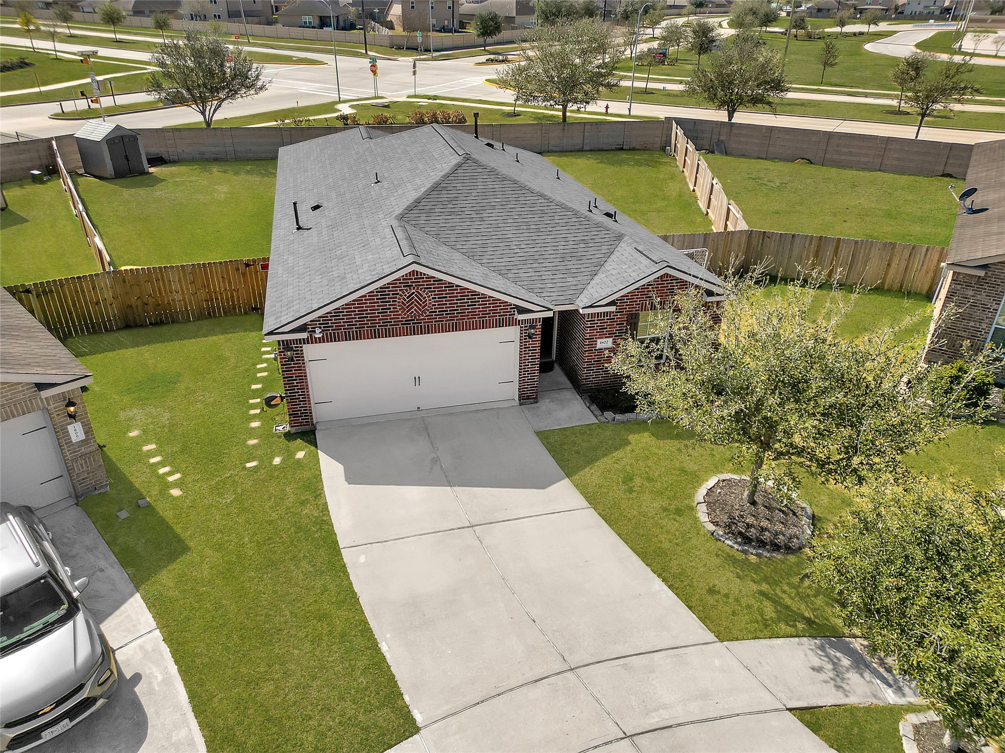 1802 Opal Peach Drive Rosharon, TX 77583 - Photo 24 of 35 a aerial view of a house with a swimming pool