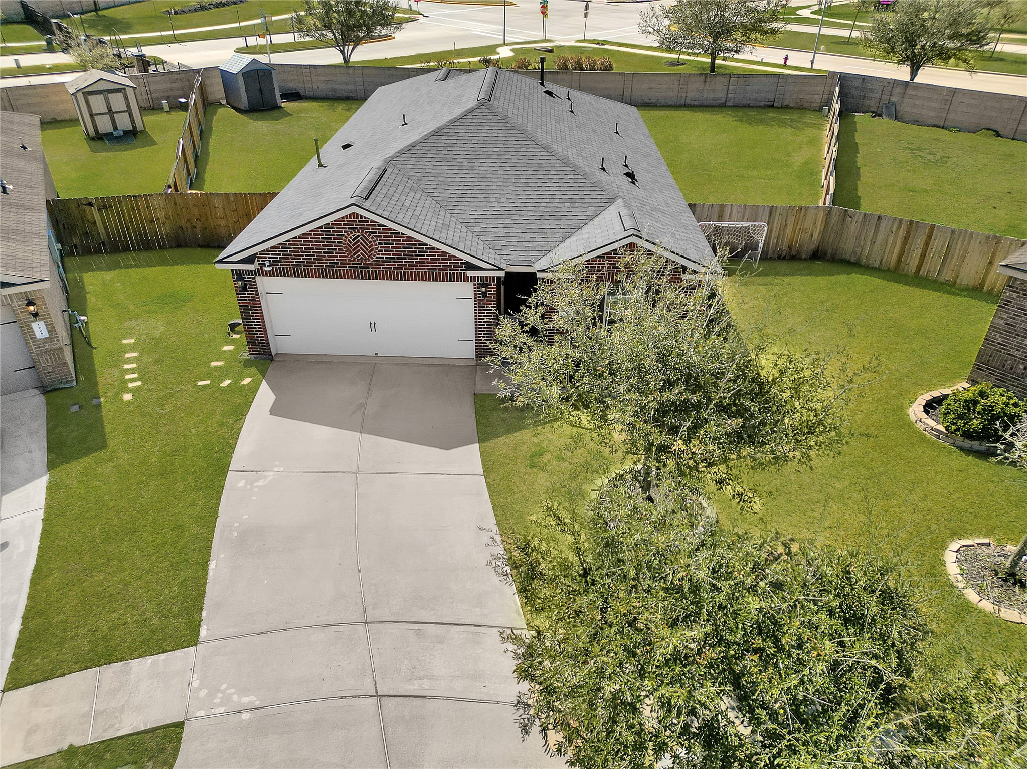 1802 Opal Peach Drive Rosharon, TX 77583 - Photo 25 of 35 a aerial view of a house with a yard