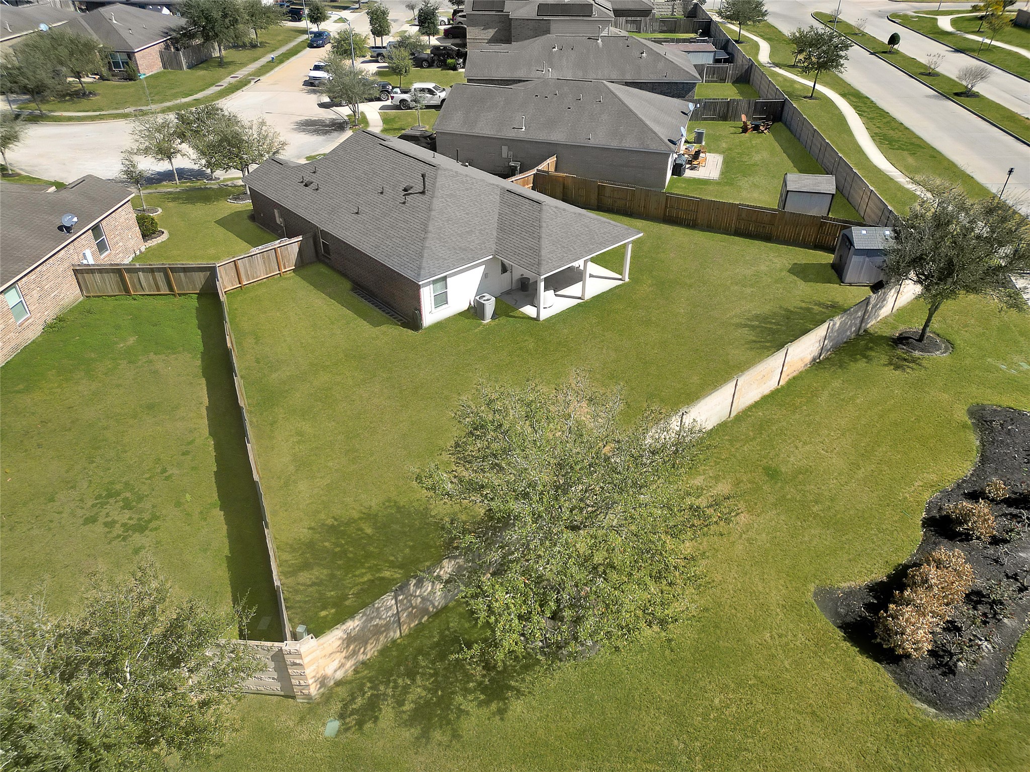 1802 Opal Peach Drive Rosharon, TX 77583 - Photo 27 of 35 an aerial view of a house with a swimming pool