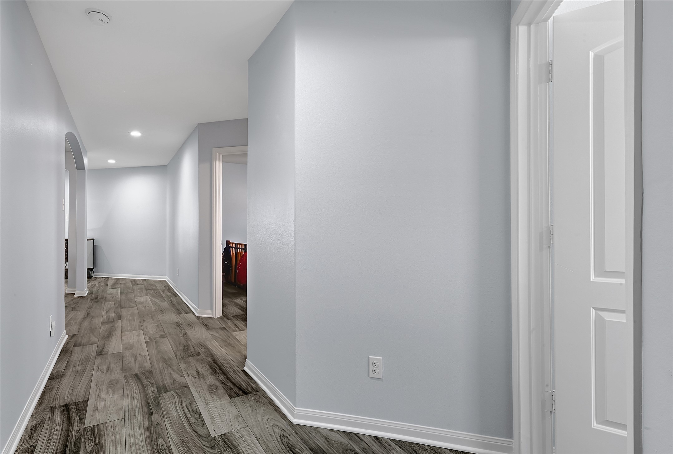 1802 Opal Peach Drive Rosharon, TX 77583 - Photo 3 of 35 a view of a hallway with wooden floor