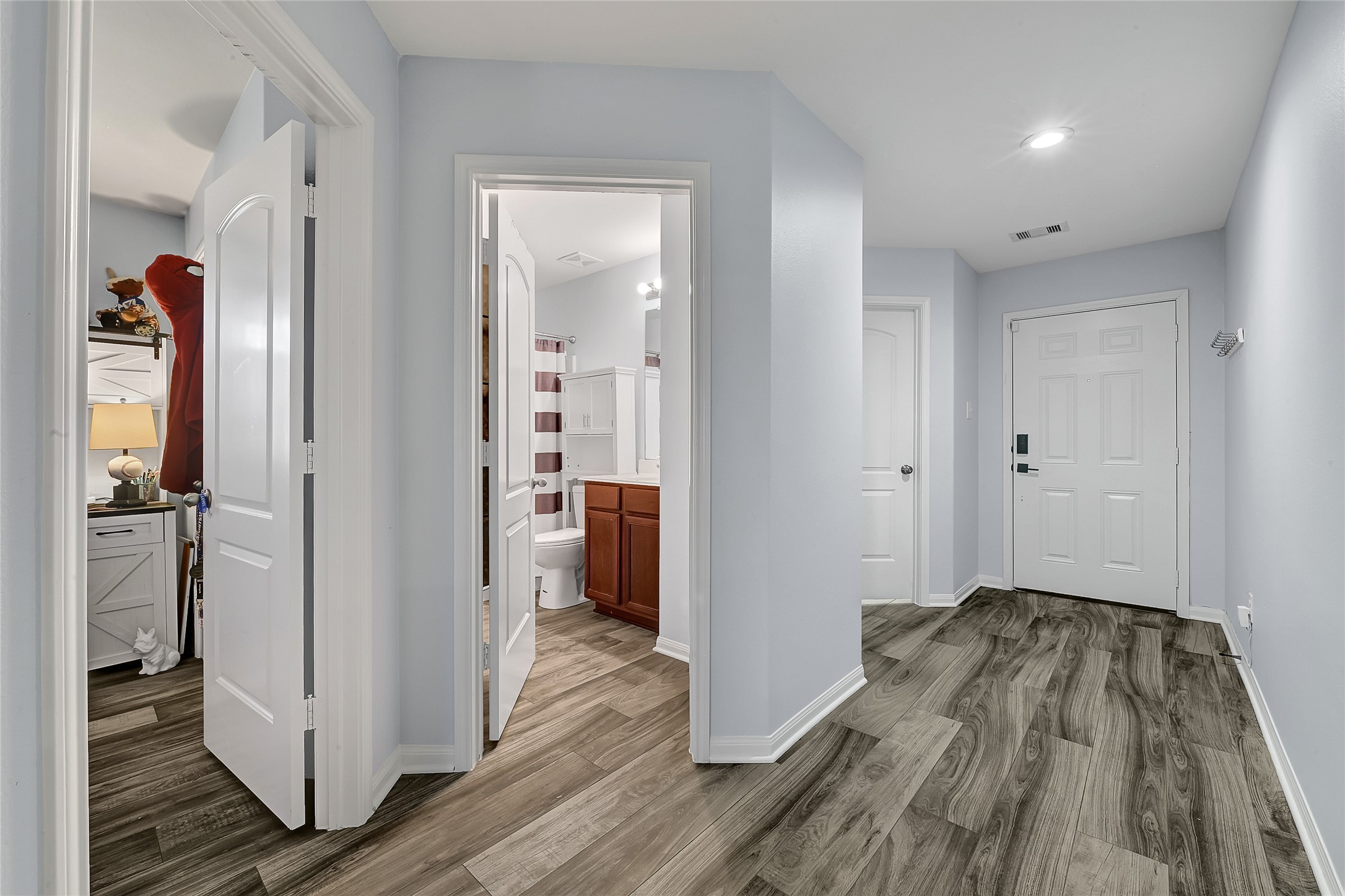 1802 Opal Peach Drive Rosharon, TX 77583 - Photo 6 of 35 a view of hallway with wooden floor