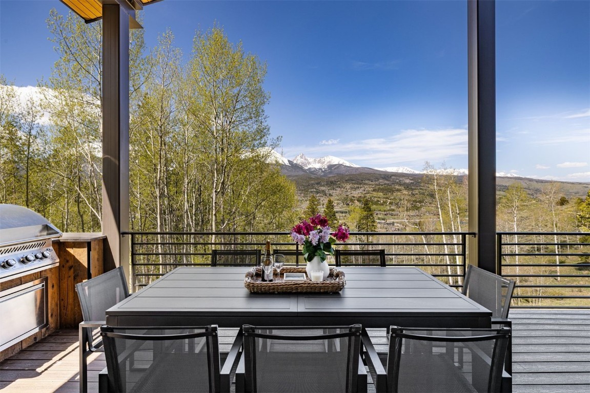 194 Angler Mountain Ranch Road Silverthorne, CO 80498 - Photo 17 of 50 a view of a dining room with furniture window and outside view