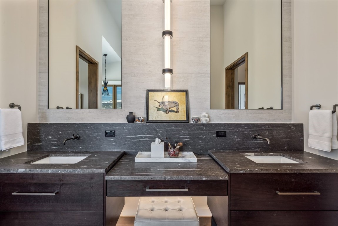 194 Angler Mountain Ranch Road Silverthorne, CO 80498 - Photo 22 of 50 a bathroom with a sink and a mirror