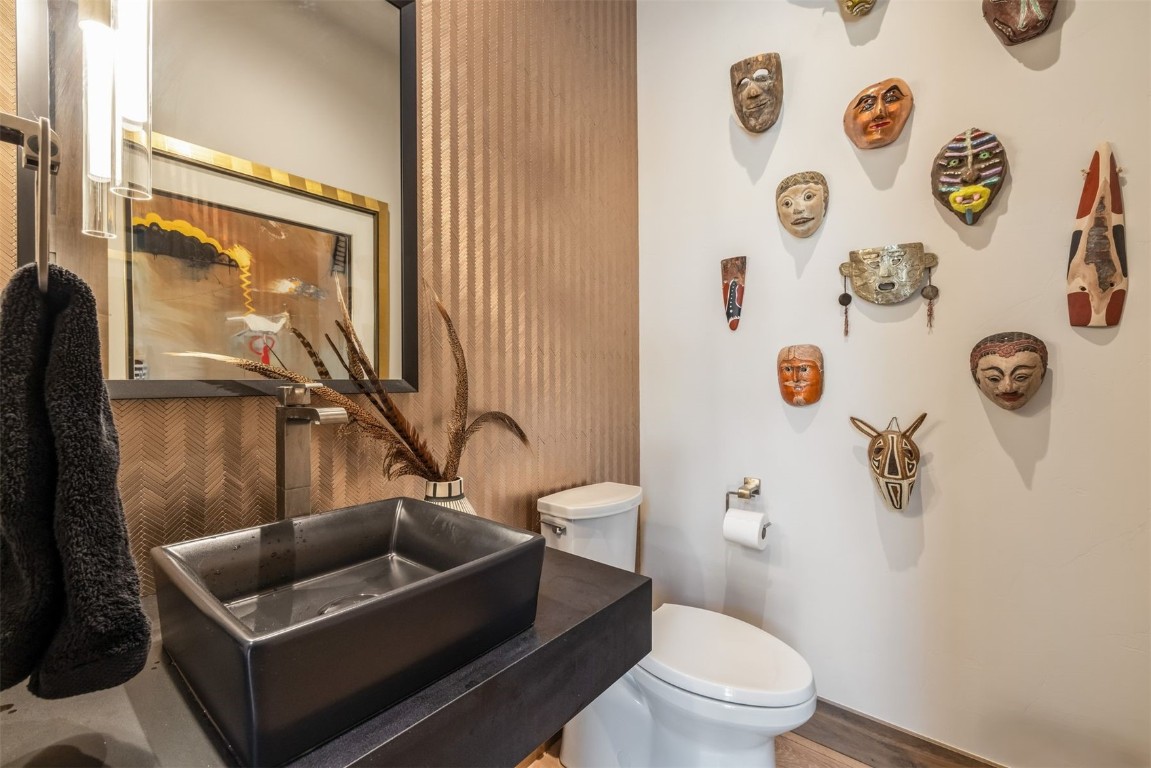 194 Angler Mountain Ranch Road Silverthorne, CO 80498 - Photo 27 of 50 a bathroom with a toilet sink and mirror