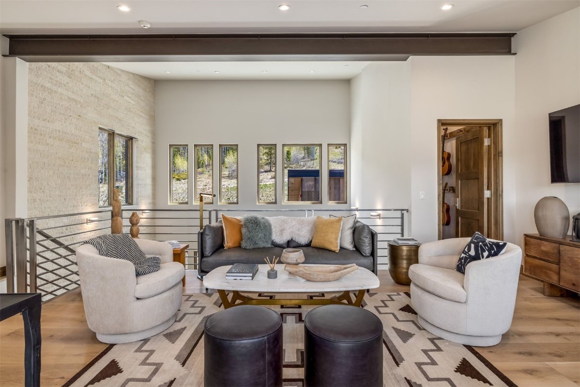 194 Angler Mountain Ranch Road Silverthorne, CO 80498 - Photo 29 of 50 a living room with furniture and a potted plant