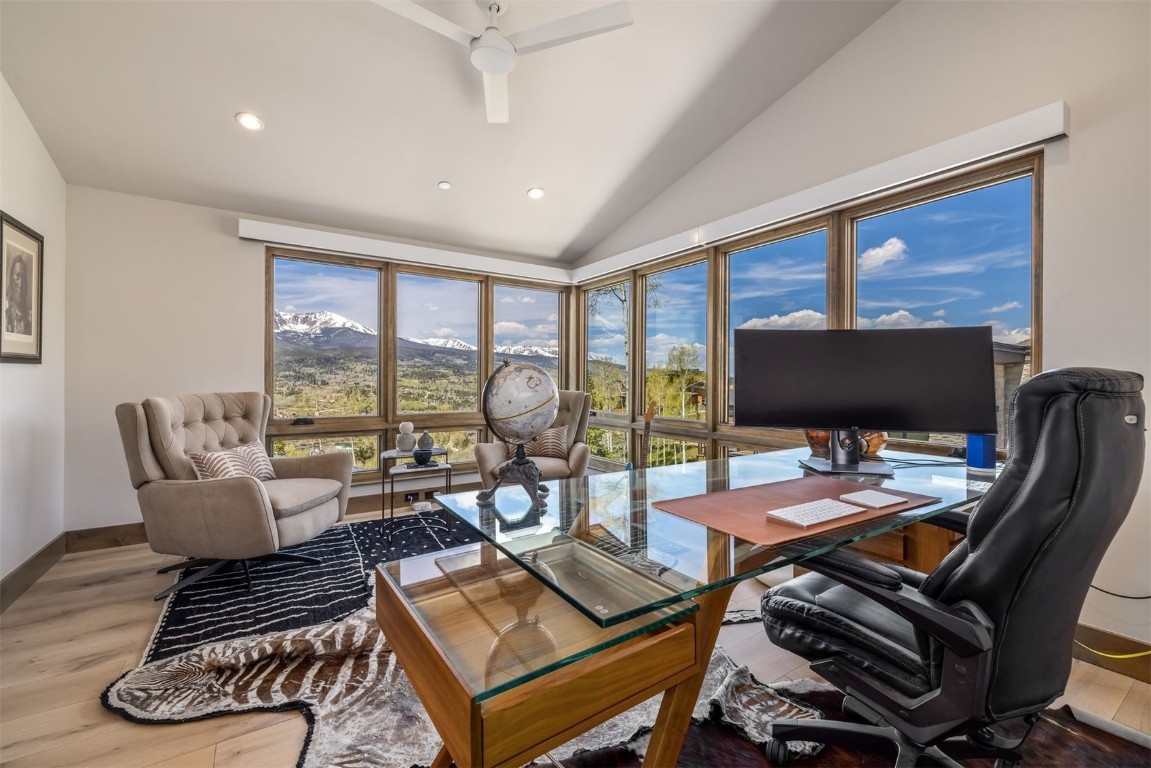 194 Angler Mountain Ranch Road Silverthorne, CO 80498 - Photo 32 of 50 a work room with furniture and a floor to ceiling window