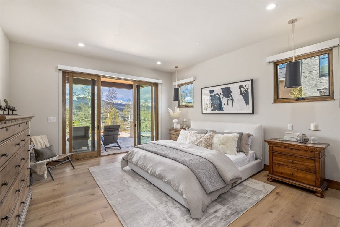 194 Angler Mountain Ranch Road Silverthorne, CO 80498 - Photo 38 of 50 a bedroom with a large bed and a window