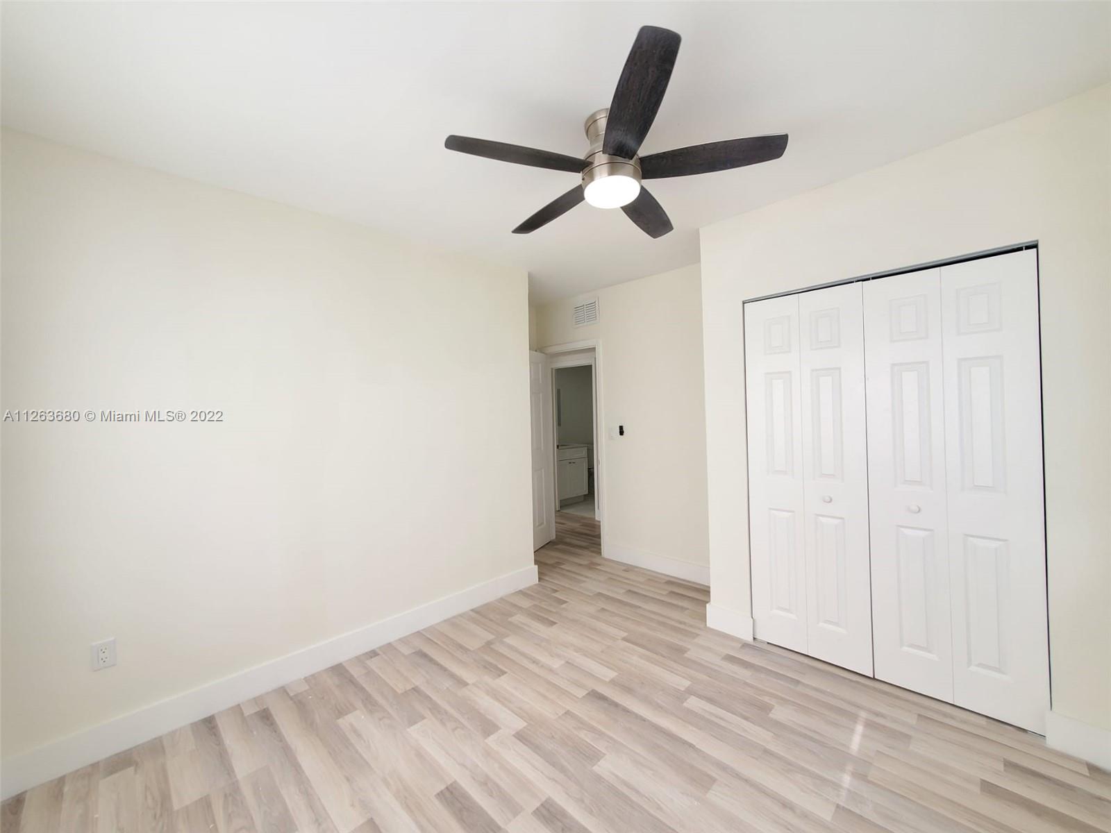 291 West 41st Street Hialeah, FL 33012 - Photo 17 of 40 a view of a room with a ceiling fan