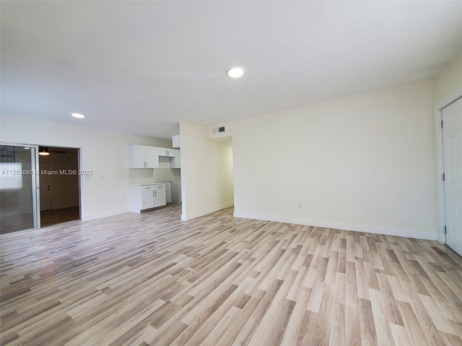 291 West 41st Street Hialeah, FL 33012 - Photo 32 of 40 a view of an empty room with closet and a window