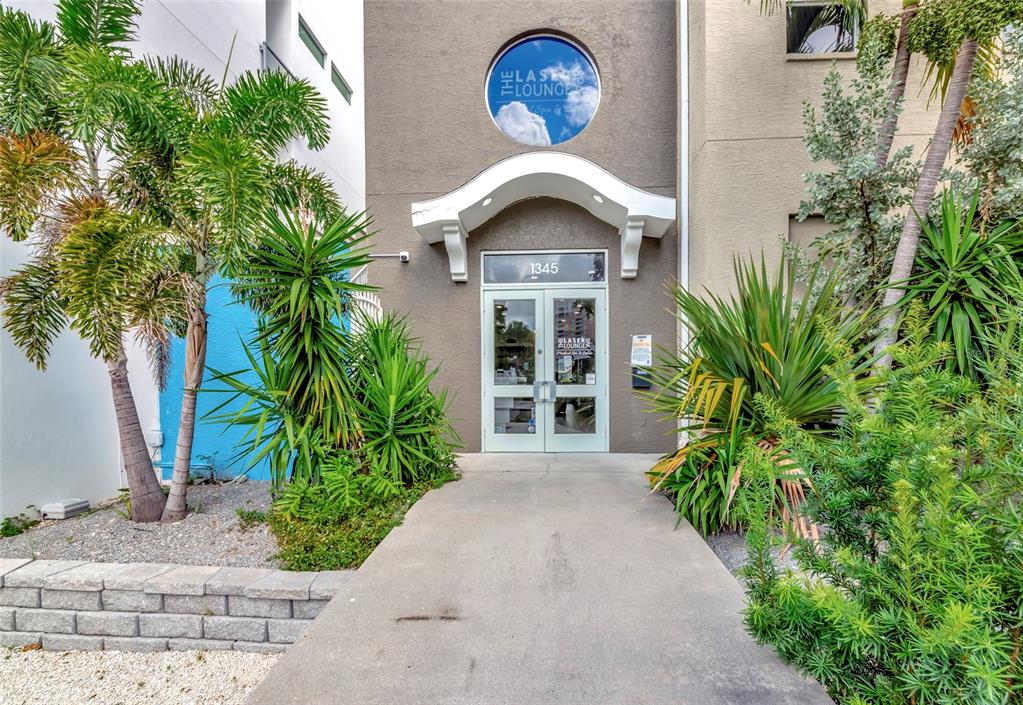 1345 2nd Street Sarasota, FL 34236 - Photo 13 of 98 a front view of a house with a yard