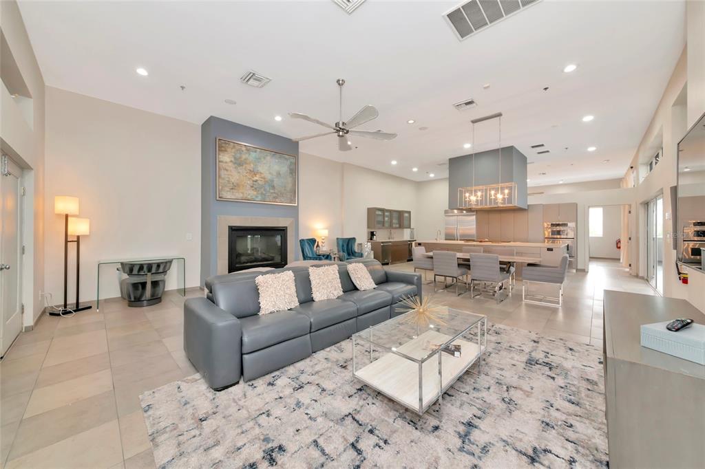 1345 2nd Street Sarasota, FL 34236 - Photo 65 of 98 a living room with furniture fireplace and kitchen view