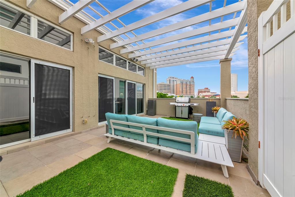 1345 2nd Street Sarasota, FL 34236 - Photo 74 of 98 a view of a porch with chairs and backyard
