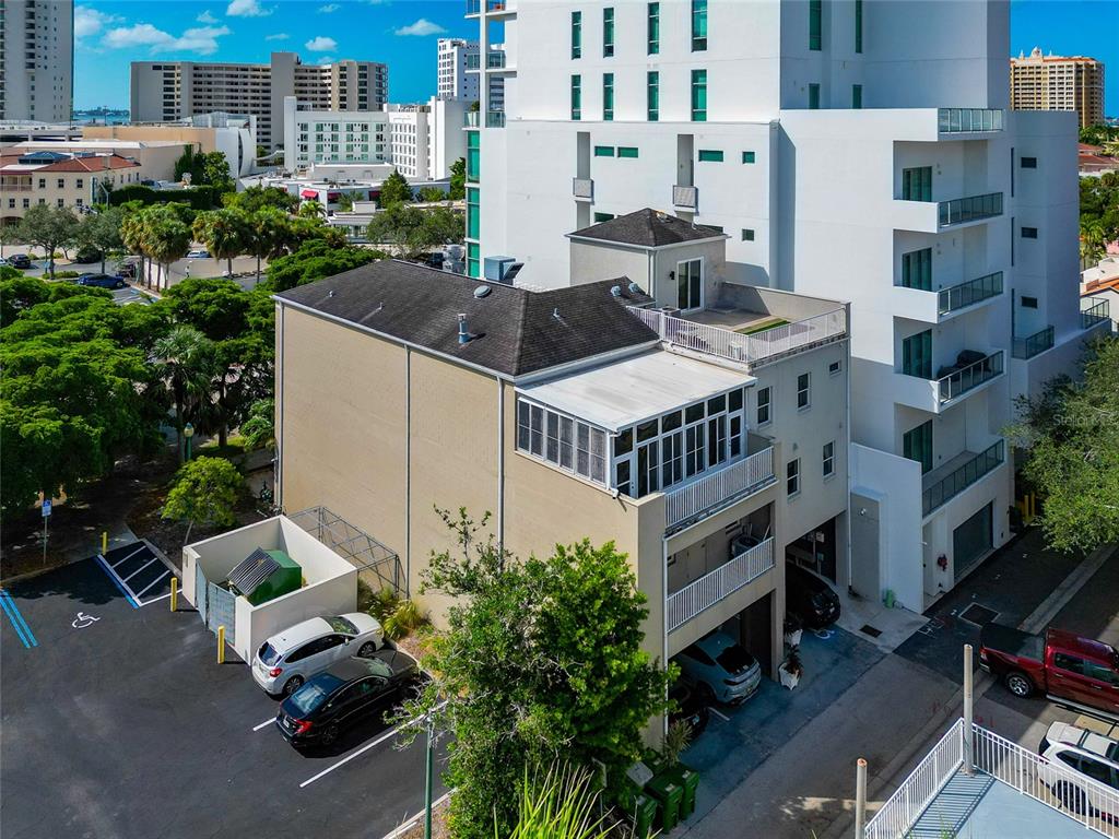 1345 2nd Street Sarasota, FL 34236 - Photo 8 of 98 a front view of building with yard and parking