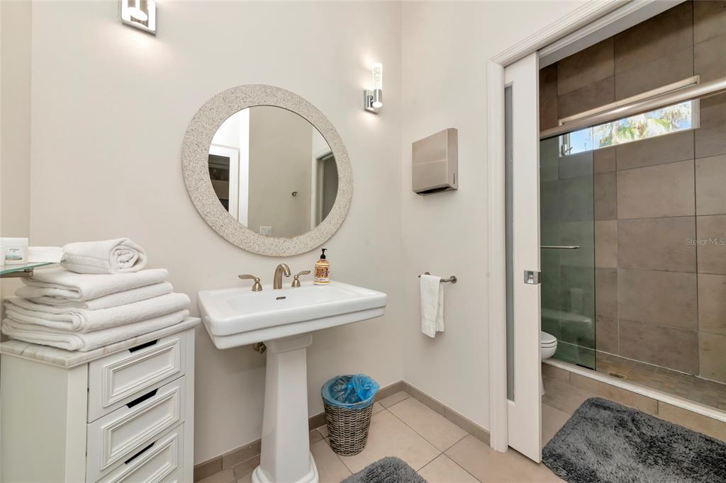 1345 2nd Street Sarasota, FL 34236 - Photo 88 of 98 a bathroom with a sink mirror and toilet
