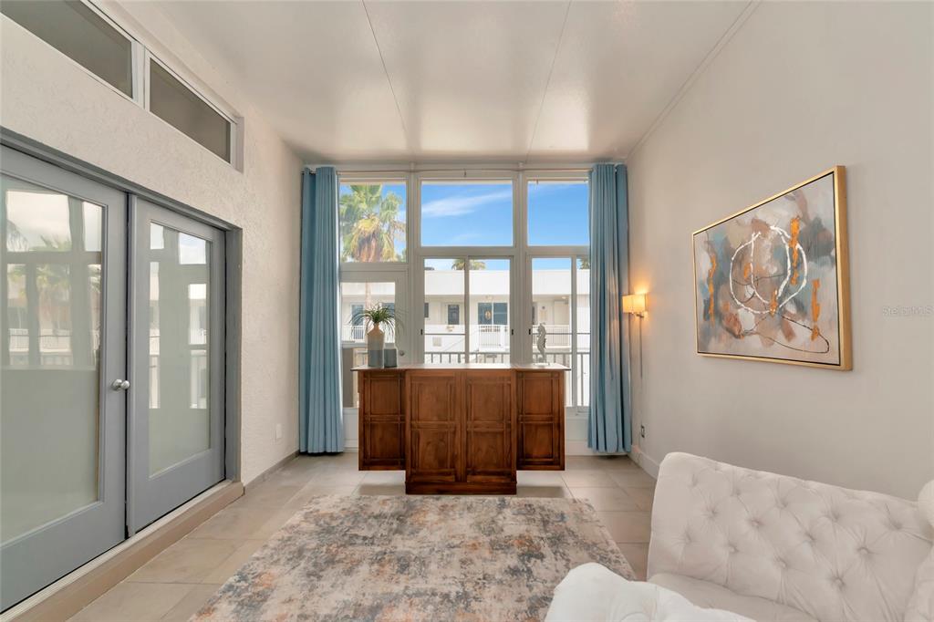 1345 2nd Street Sarasota, FL 34236 - Photo 91 of 98 a living room with a couch and a window