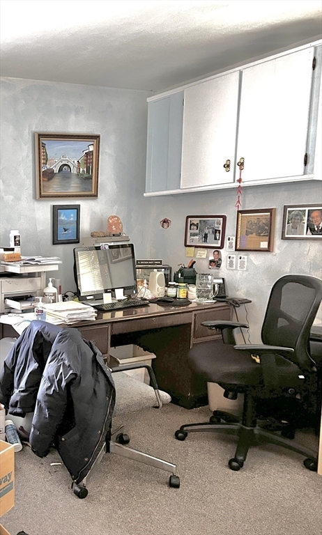 755 Grattan Street Chicopee, MA 01020 - Photo 11 of 39 a workspace with a couch and musical instruments