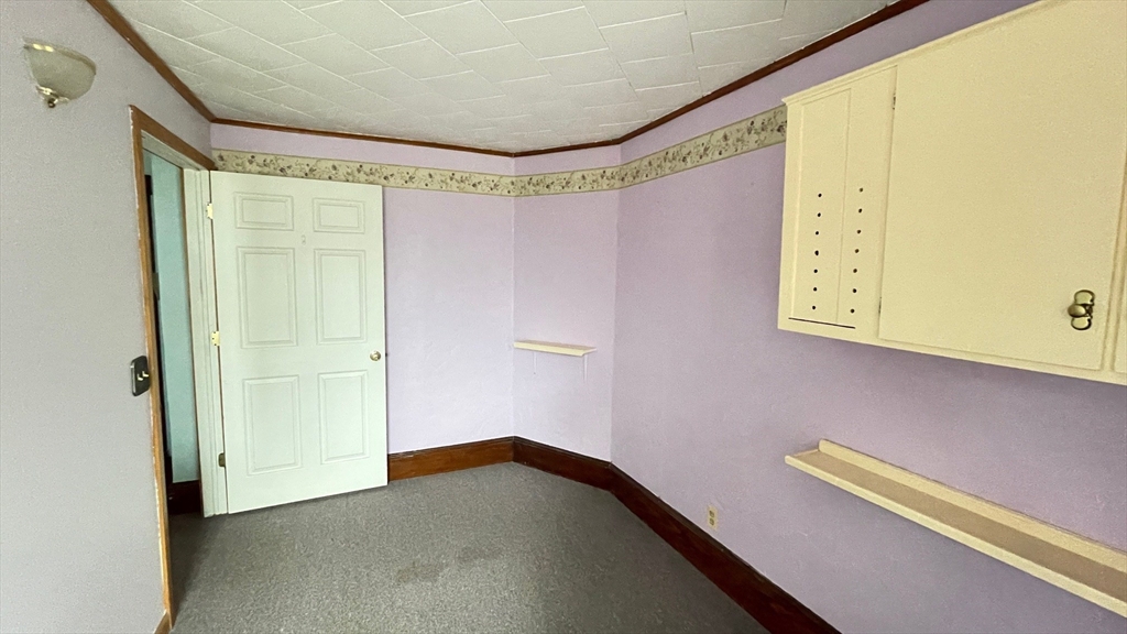 755 Grattan Street Chicopee, MA 01020 - Photo 14 of 39 a hallway with front door